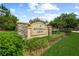 Riverwalk Grove community entrance sign with landscaping at 11606 Water Poppy Ter, Lakewood Ranch, FL 34202