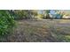 Overgrown vacant lot ready for new construction at 12512 Hicks Rd, Hudson, FL 34669