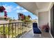 Private balcony with lounge chair and view of the community at 1333 Perico Pointe Cir, Bradenton, FL 34209