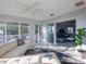 Open living space with sectional sofa, and access to patio at 1333 Perico Pointe Cir, Bradenton, FL 34209