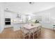 Modern kitchen with white cabinetry, stainless steel appliances, and island at 1756 Stapleton St, Sarasota, FL 34239