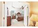 Main bedroom with a king-size bed and ensuite bathroom at 1800 Scarlett Ave, North Port, FL 34289