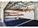 Garage with built-in shelving and flooring at 1800 Scarlett Ave, North Port, FL 34289