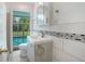 Updated bathroom with vanity, toilet and shower at 208 36Th W St, Bradenton, FL 34205