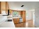 Kitchen with wood cabinets, appliances and ample counter space at 208 36Th W St, Bradenton, FL 34205