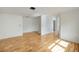 Bright living room featuring hardwood floors and an open floor plan at 208 36Th W St, Bradenton, FL 34205