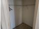 Walk-in closet with wire shelving and hanging rods at 25692 Aysen Dr, Punta Gorda, FL 33983