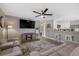 Spacious living room featuring a large TV and comfy sofas at 292 Dorchester St, Port Charlotte, FL 33954