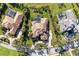 Luxury home community with tile-roof houses and lush landscaping at 3408 Founders Club Dr, Sarasota, FL 34240