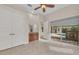 Bedroom with pool and fireplace view at 3408 Founders Club Dr, Sarasota, FL 34240