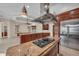 Spacious kitchen featuring stainless steel range and large kitchen island perfect for entertaining at 3408 Founders Club Dr, Sarasota, FL 34240