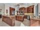 Well-equipped kitchen with a large island, stainless steel appliances, and custom cabinetry for ample storage at 3408 Founders Club Dr, Sarasota, FL 34240
