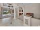 Spacious living area with tile flooring and an open layout perfect for entertaining at 3408 Founders Club Dr, Sarasota, FL 34240