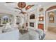 Cozy living room with fireplace, stylish decor, and ample seating for entertaining guests at 3408 Founders Club Dr, Sarasota, FL 34240