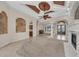 Expansive living room showcasing architectural details, natural light, and a view of the front entrance at 3408 Founders Club Dr, Sarasota, FL 34240