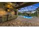 The outdoor kitchen is perfect for entertaining and poolside enjoyment at 3408 Founders Club Dr, Sarasota, FL 34240