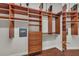 Custom walk-in closet with built-in shelving, drawers, and hanging rods for optimal storage at 3408 Founders Club Dr, Sarasota, FL 34240