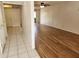 View of entryway with tile and wood floors leading to the living room at 3773 Delta St # 81, Sarasota, FL 34232