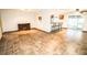 Spacious living room with tile floors and a fireplace at 4160 Fruitville Rd # 8, Sarasota, FL 34232