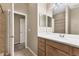 Bathroom with double vanity and large mirror at 4207 Overture Cir, Bradenton, FL 34209