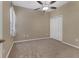 Simple bedroom with neutral walls, carpet flooring, and double door closet at 4207 Overture Cir, Bradenton, FL 34209