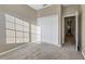Bedroom with double door closet and hallway view at 4207 Overture Cir, Bradenton, FL 34209