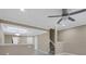 Spacious living room with high ceilings and ceiling fan at 4207 Overture Cir, Bradenton, FL 34209