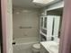 Bathroom with shower/tub combo, toilet, and vanity at 435 30Th W Ave # D103, Bradenton, FL 34205