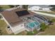 Aerial view showing home, pool, and community amenities including a park and tennis court at 4569 35Th Avenue E Cir, Palmetto, FL 34221