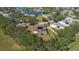 Home with solar panels and a pool in a neighborhood at 4569 35Th Avenue E Cir, Palmetto, FL 34221