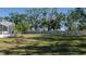 Large backyard with grassy area and privacy fence at 4569 35Th Avenue E Cir, Palmetto, FL 34221