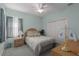 Cozy bedroom with double closet and ceiling fan at 4569 35Th Avenue E Cir, Palmetto, FL 34221