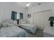 Cozy guest bedroom with twin beds and ample closet space at 4569 35Th Avenue E Cir, Palmetto, FL 34221