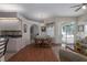 Small dining area with a round table and four chairs, near the kitchen at 4569 35Th Avenue E Cir, Palmetto, FL 34221