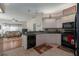 Spacious kitchen with ample counter space, stainless steel appliances, and a breakfast bar at 4569 35Th Avenue E Cir, Palmetto, FL 34221