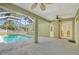 Pool area with screened enclosure and access to house at 5365 Matthew Ct, Sarasota, FL 34231