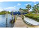 Private boat lift and dock with additional space for smaller boats at 5485 56Th E Ct, Bradenton, FL 34203