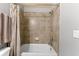 Bathroom with a bathtub and shower at 5548 Palmer Cir # 102, Bradenton, FL 34211