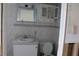 Bathroom with vanity, toilet, and medicine cabinet at 6203 Marina Dr, Holmes Beach, FL 34217