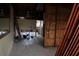 Large living area with exposed wooden beams and tiled floors at 6203 Marina Dr, Holmes Beach, FL 34217