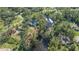 Bird's-eye view showcasing home's location on a tranquil waterway at 6246 Ravenwood Dr, Sarasota, FL 34243