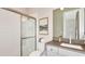 Clean bathroom with a shower and single vanity at 8156 Moonbeam Ave, Sarasota, FL 34241