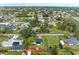 Aerial view of house and surrounding area at 875 Royal Rd, Venice, FL 34293