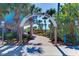 Entrance to Venice Fishing Pier, featuring a welcoming arch and pathway to the beach at 875 Royal Rd, Venice, FL 34293