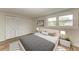 Bright bedroom with a comfortable bed and ample closet space at 875 Royal Rd, Venice, FL 34293