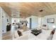 Open concept living and dining area with modern decor at 875 Royal Rd, Venice, FL 34293