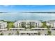 Waterfront condo building with parking and beautiful landscaping at 910 Tidewater Shores Loop # 304, Bradenton, FL 34208