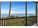 Serene balcony boasting stunning water views and a screened enclosure at 910 Tidewater Shores Loop # 304, Bradenton, FL 34208