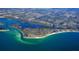 Aerial view of Siesta Key, showcasing its coastline and neighborhoods at 925 Beach Rd # 408, Sarasota, FL 34242