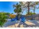 Enjoy evening gatherings around this fire pit with comfortable blue chairs at 1107 60Th W St, Bradenton, FL 34209